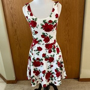 Divided floral mini tank dress never worn size 6 runs line x small